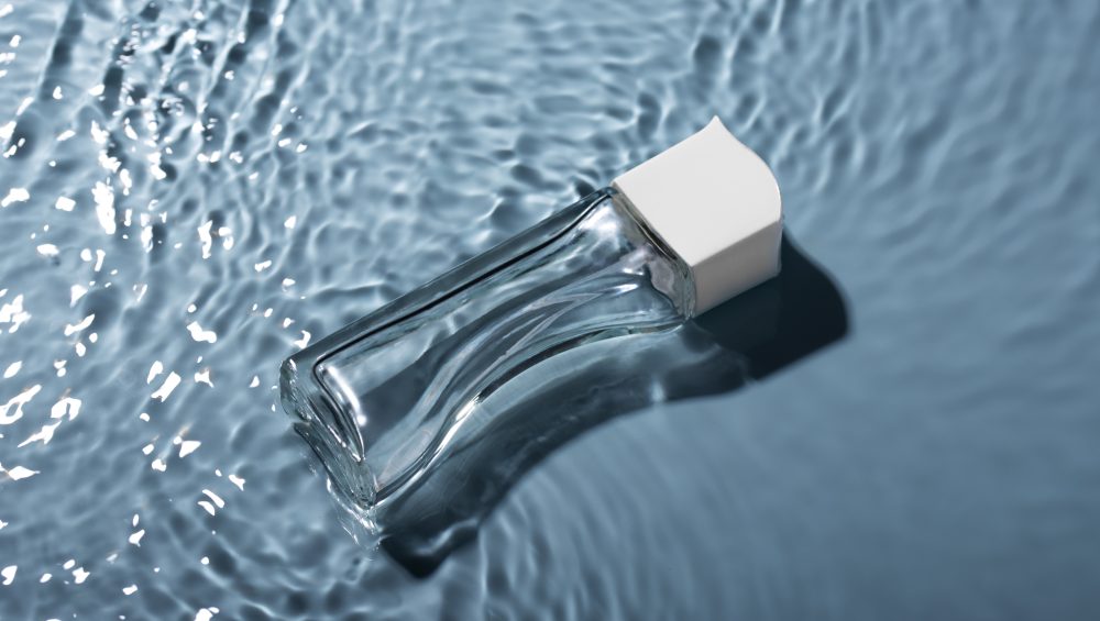 close-up-perfume-floating-water